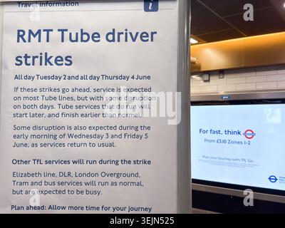 London UK, 29th May 2026. A printed Transport for London (TfL) customer notice inside a station advises passengers of upcoming RMT Tube driver strikes scheduled for Tuesday 2 June and Thursday 4 June. The paper advisory details widespread disruption and late morning restarts across the London Underground network, framed alongside a glowing digital LED advertising display screen on the tube station wall.   Credit:glosszoom/Alamy Live News Stock Photo