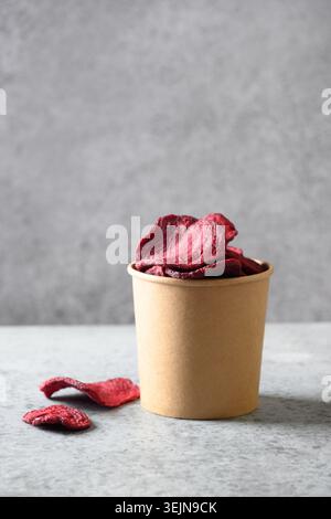 Vegetable beetroot vegan chips in craft box. Stock Photo
