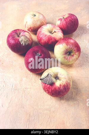 Apples scattered on the table, selective focus, yellow - red, summer variety, early, no people, Stock Photo