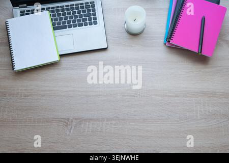 Minimal workspace with laptop notebooks and copy space Stock Photo