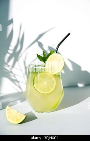 Detox peach beverage in glass garnish mint. Close up. Stock Photo