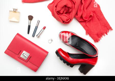 Collection of red women's accessories for special date or holiday. Flat lay. Stock Photo