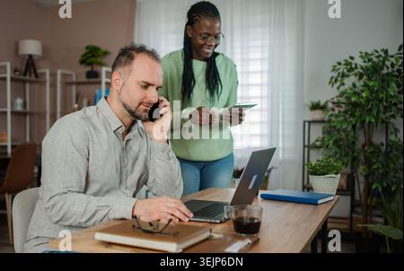 Diverse business team working remotely from home office Stock Photo