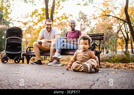 Mixed race couple with their son in park Stock Photo