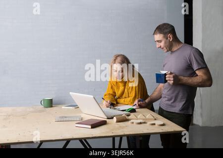 Family business., small business. scheduling. people in the workplace are discussing a working strategy for doing business Stock Photo