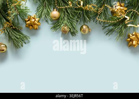 Christmas border with evergreen branches and cones. Stock Photo