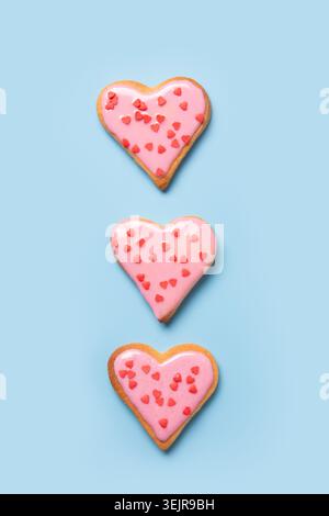 Homemade heart shaped cookies on white table. Stock Photo