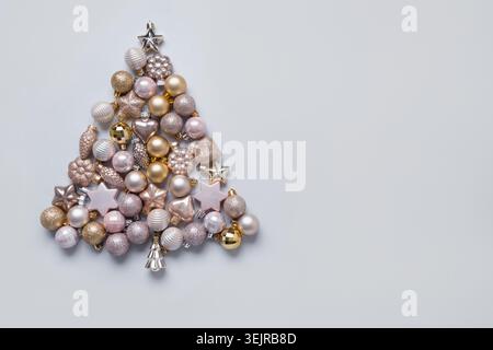 Christmas tree made of silver pastel balls. Xmas card. Stock Photo