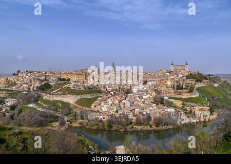 Panoramic view of Toledo from across the Tagus river, Spain, high angle view. Medieval city skyline under clear bright sky Stock Photo