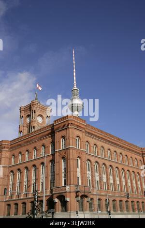 Red Town Hall (Rotes Rathaus) from Spandauer Strasse, Berlin, Germany, 2025. Building constructed between 1861 and 1869 based on a design by architect Hermann Friedrich Waesemann, (1813-1879) in the style of the Northern Italy High Renaissance. It replaced several medieval buildings that occupied the entire block. It houses the offices of the mayor and the government of the federal state of Berlin, (Senate of Berlin). The building was heavily damaged by Allied bombing in World War II and rebuilt to the original plans between 1951 and 1956. As it was located in the Soviet-occupied sector of the Stock Photo