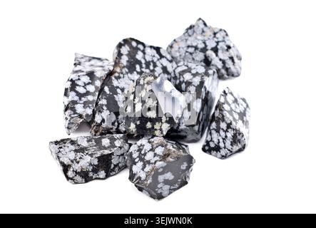 Group of raw Snowflake obsidians, semi precious stones, on white background. Stock Photo