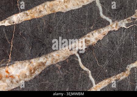 Glossy dark gray marble with white cristal golden veins background material texture Stock Photo