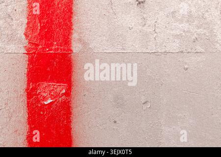 Grunge surface painted with silver paint and a red stripe copy space background texture Stock Photo