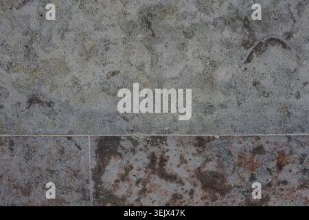 Gray and brown tones blend naturally over time. Cracks and stains tell stories of wear and history. Suitable for rustic, vintage Stock Photo