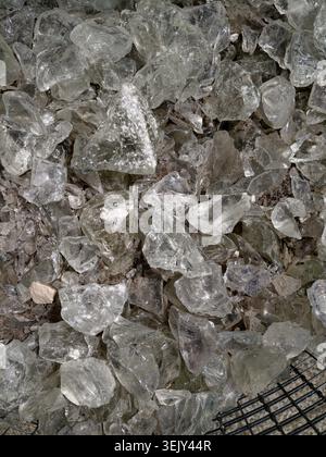 Decorative colorful stones background texture. Crushed mineral gravel chip mix Stock Photo