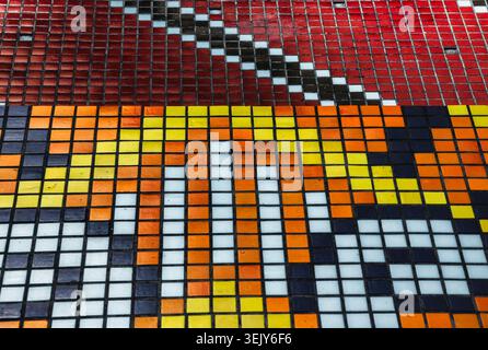 Geometric tile designs on a wall Stock Photo