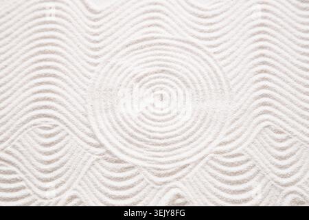 Circle pattern in white sand Stock Photo