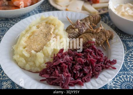 German beef roulades with red cabbage and mashed potatoes Stock Photo