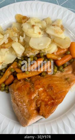 Salmon with vegetables and potatoes Stock Photo