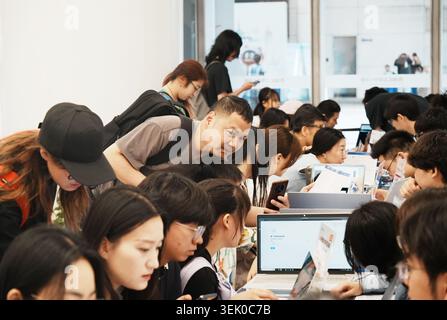 Engineers from Tencent Cloud Developer Community installed the open-source AI intelligent agent OpenClaw for free for citizens in Jiangcun Street, Hangzhou, Zhejiang Province, China on May 30, 2026. Stock Photo