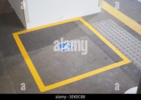Accessible space marked on a textured floor Stock Photo