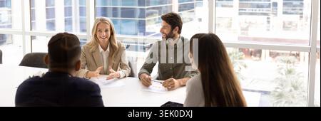 Business team discussing joint project in office Stock Photo