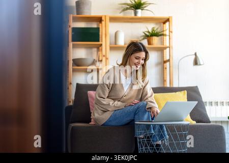 Success woman freelancer is working on a new project on laptop. Work business people concept. Stock Photo