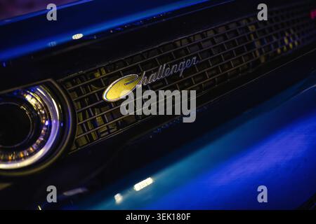 Rome, italy 29 may 2026: dodge challenger front grill and emblem with bright headlight, showcasing muscular automotive design, chrome detail and moder Stock Photo