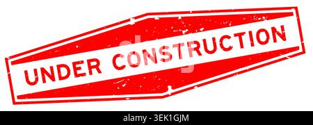 Grunge red under construction word hexagon rubber seal stamp on white background Stock Vector