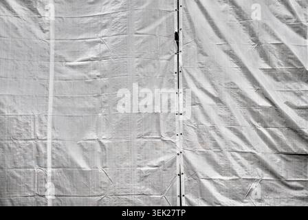 Construction fence tarpaulin made of white polyethylene, Warburg, North Rhine-Westphalia, Germany, Europe Stock Photo