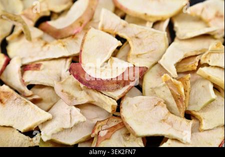 Homemade dried organic apple slices. Full frame, background and texture. Stock Photo