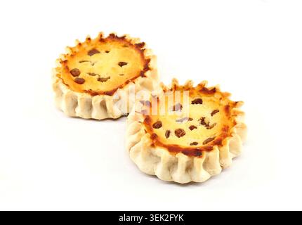 Pardulas or Formaggelle on  white background. It is a typical Sardinian Easter cake made with ricotta or cheese. Stock Photo