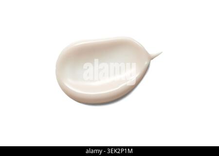 Cream smudge creating a cosmetic swatch, showing texture on a white background, ideal for beauty and skincare concepts Stock Photo