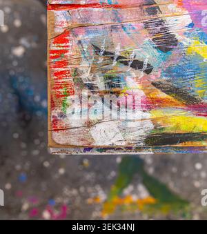 detail image of a plywood work table in an artists studio Stock Photo