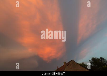 Dramatic storm clouds over fields near Beauvoir, Normandy, France. Stock Photo