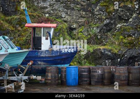 Dunure village harbour in Ayrshire, boats stored on land Stock Photo