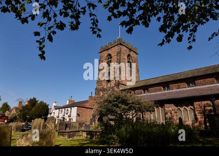 Grappenhall village in the Borough of Warrington in Cheshire. Pictured St Wilfrid's Church Stock Photo