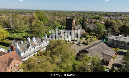 Aerial, Grappenhall village in the Borough of Warrington in Cheshire. Pictured St Wilfrid's Church and the Rams Head Inn Stock Photo