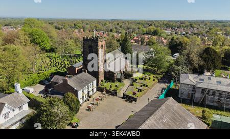 Aerial, Grappenhall village in the Borough of Warrington in Cheshire. Pictured St Wilfrid's Church and the Rams Head Inn Stock Photo