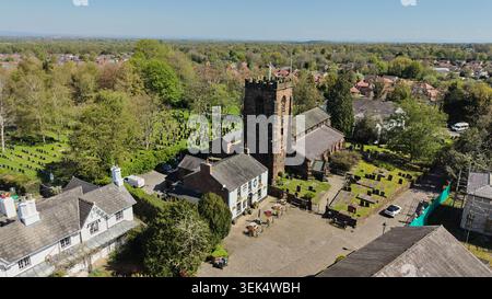 Aerial, Grappenhall village in the Borough of Warrington in Cheshire. Pictured St Wilfrid's Church and the Rams Head Inn Stock Photo