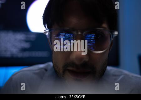 Young Latin Programmer Glasses With Code Reflection On Lens Stock Photo