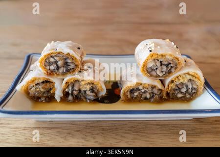Crispy truffle and mixed mushroom rice noodle. Stock Photo
