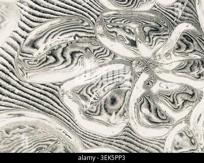 Soft Bokeh Abstract Of Reflective Metallic Highlights And Blurred Silver Light For Background Stock Photo