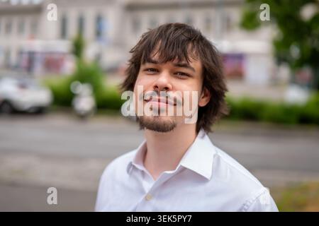 Portrait of smiling young man. Stock Photo
