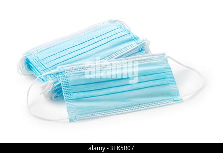 Stack of Disposable Surgical Face Masks Isolated on White Background Stock Photo