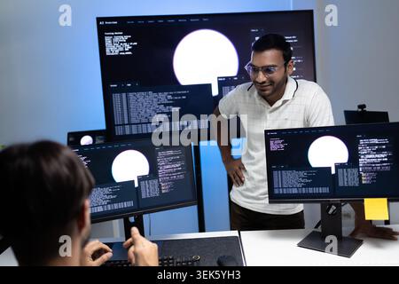 Coding Instructor Teaching AI Programming Lesson To Student In Tech Office Stock Photo