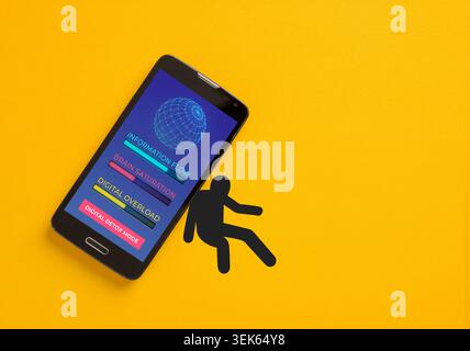 Digital overload and information saturation concept with smartphone crushing a person icon on yellow background Stock Photo