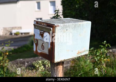 Old French rural postbox Stock Photo
