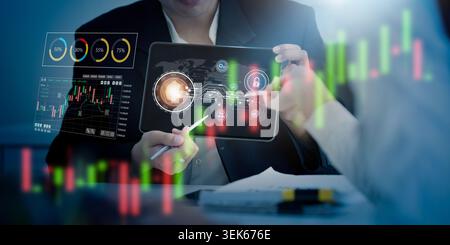 Business professionals analyzing AI data on digital tablet for financial technology Stock Photo