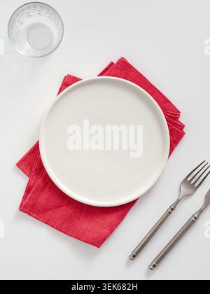 Elegant dinner place setting on white background Stock Photo